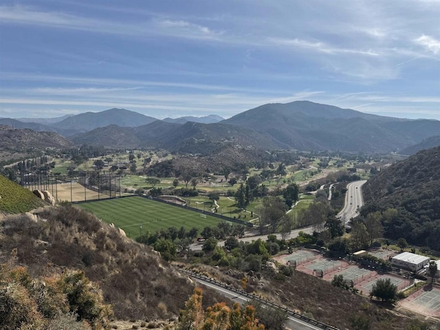 view of mountain feature with a rural view