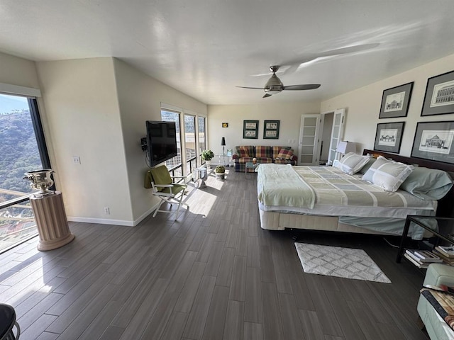 bedroom with access to outside, dark wood-style flooring, baseboards, and a ceiling fan