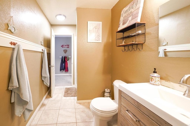 16233 Oakley Rd, Ramona, CA 92065 - bathroom with toilet, vanity, baseboards, and tile patterned floors