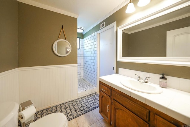 16233 Oakley Rd, Ramona, CA 92065 - full bathroom with a stall shower, wainscoting, toilet, crown molding, and vanity