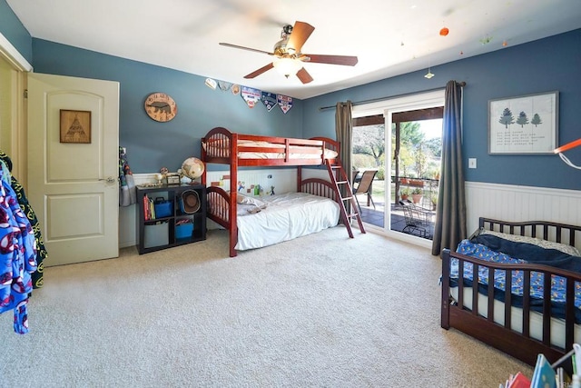 16233 Oakley Rd, Ramona, CA 92065 - bedroom featuring carpet, access to outside, a ceiling fan, and wainscoting