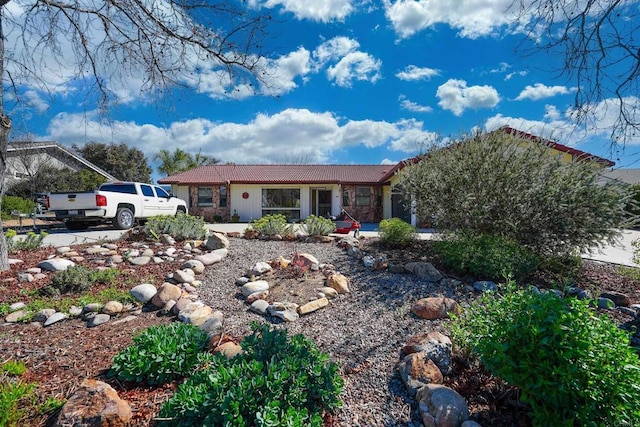 view of front of house with a tiled roof