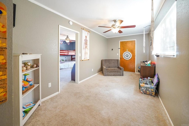 16233 Oakley Rd, Ramona, CA 92065 - living area with carpet floors, baseboards, ornamental molding, and ceiling fan