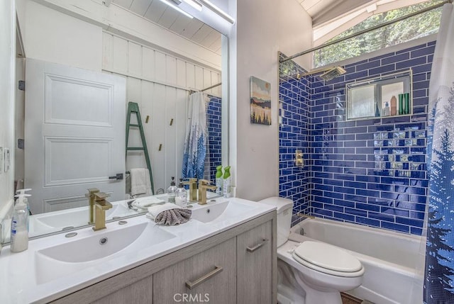 bathroom with toilet, double vanity, shower / bath combo, and a sink