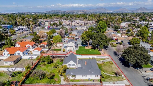 aerial view featuring a residential view and a mountain view