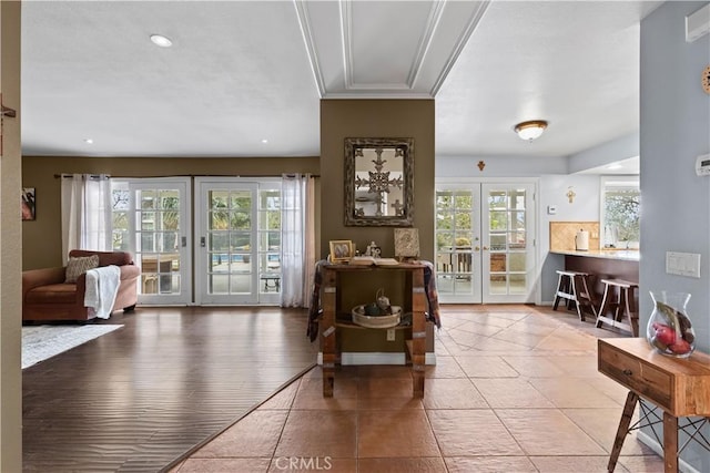 foyer with french doors and recessed lighting