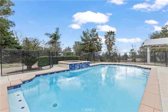 view of pool with an in ground hot tub, fence, and a fenced in pool