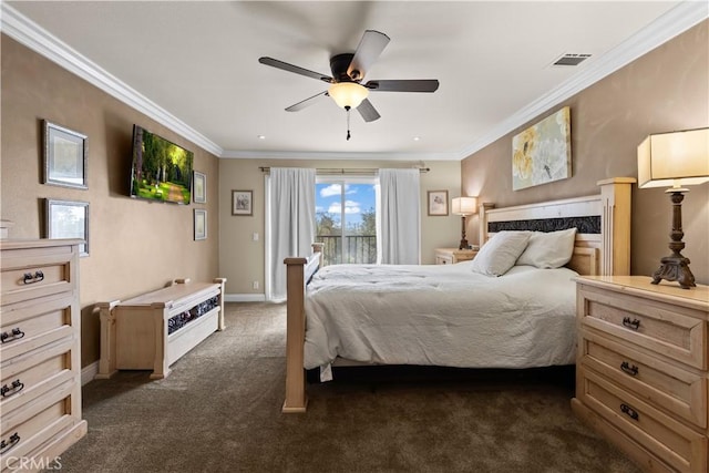 bedroom with ornamental molding, dark colored carpet, and visible vents