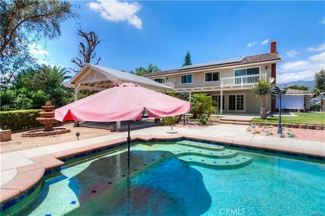 pool featuring a patio