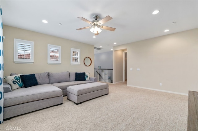 living room featuring carpet, recessed lighting, visible vents, a ceiling fan, and baseboards