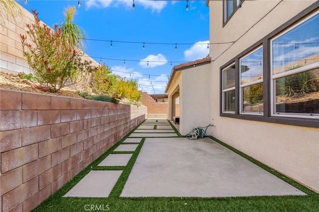 view of patio featuring a fenced backyard