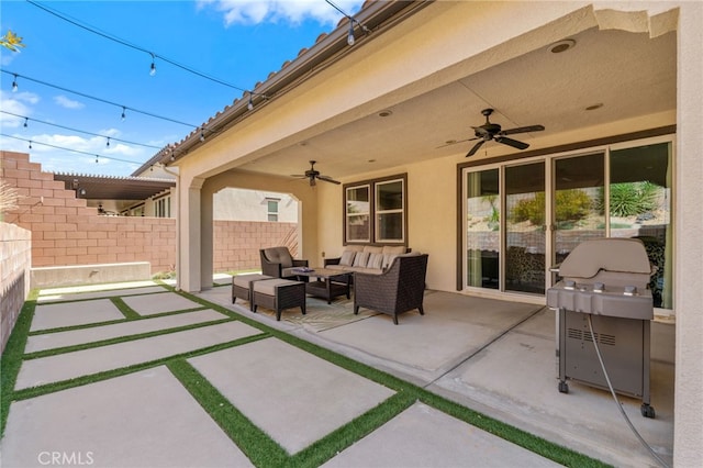 view of patio / terrace with ceiling fan, a grill, fence, and an outdoor hangout area