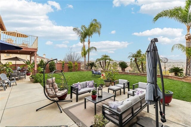 25 Vista Toscana, Lake Elsinore, CA 92532 - view of patio / terrace with an outdoor living space and a balcony