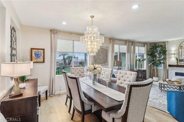 25 Vista Toscana, Lake Elsinore, CA 92532 - dining room with a chandelier, plenty of natural light, light wood-type flooring, recessed lighting, and baseboards