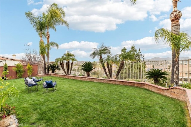 view of yard with a fenced backyard