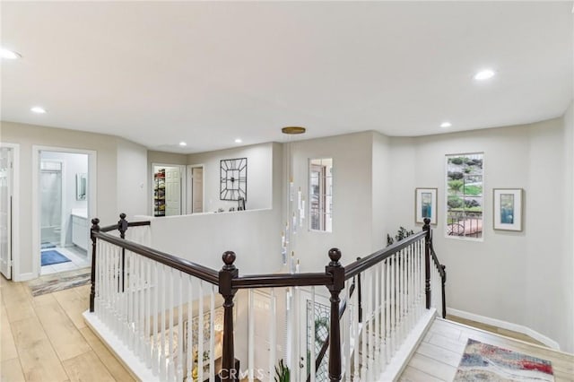 25 Vista Toscana, Lake Elsinore, CA 92532 - corridor with an upstairs landing, wood finished floors, recessed lighting, and baseboards
