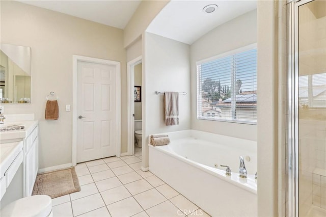 25 Vista Toscana, Lake Elsinore, CA 92532 - full bathroom featuring toilet, vanity, a bath, a stall shower, and tile patterned floors