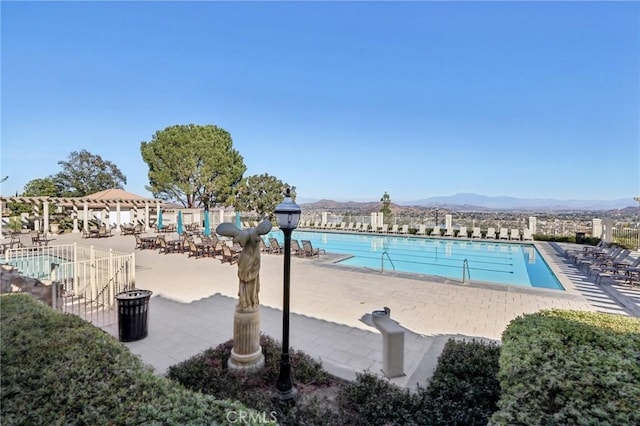 25 Vista Toscana, Lake Elsinore, CA 92532 - community pool featuring a mountain view and a patio