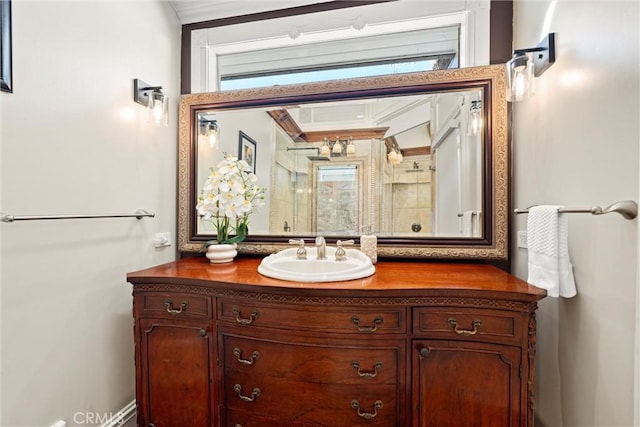bathroom featuring walk in shower, vanity, and plenty of natural light
