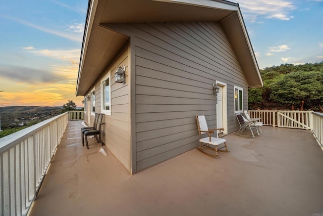 view of property exterior at dusk