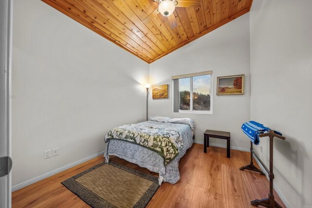 35465 Sunset Ln, Julian, CA 92036 - bedroom featuring vaulted ceiling, wooden ceiling, wood finished floors, and crown molding