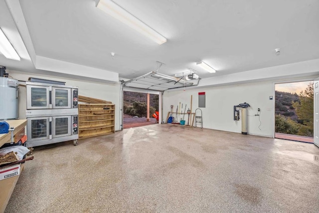 35465 Sunset Ln, Julian, CA 92036 - garage featuring a garage door opener and water heater