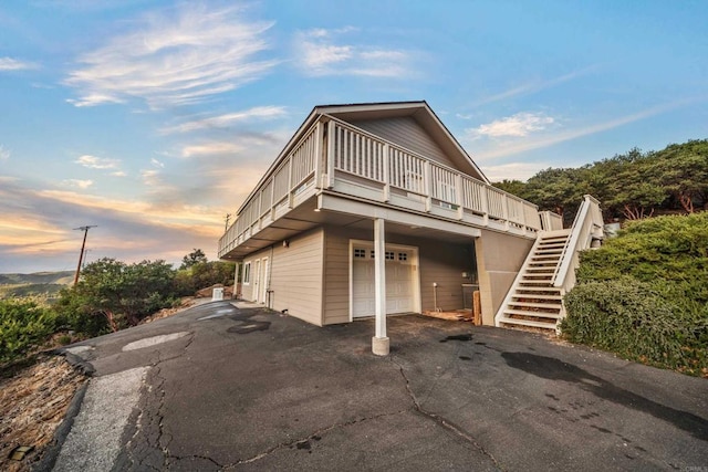 35465 Sunset Ln, Julian, CA 92036 - property exterior at dusk featuring stairs and asphalt driveway
