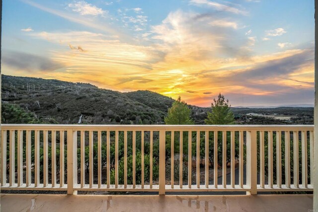 35465 Sunset Ln, Julian, CA 92036 - balcony at dusk with a mountain view