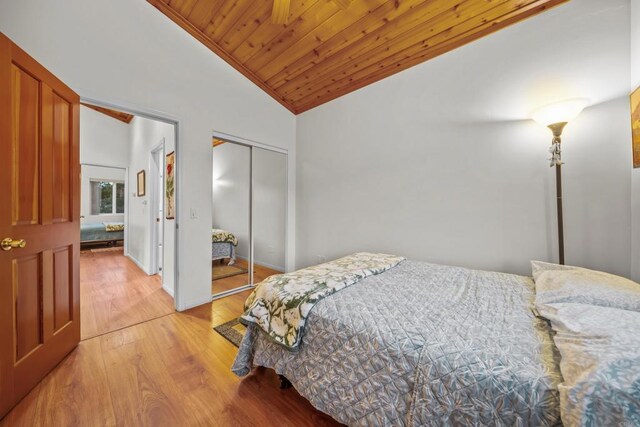 35465 Sunset Ln, Julian, CA 92036 - bedroom with lofted ceiling, light wood finished floors, wood ceiling, and a closet
