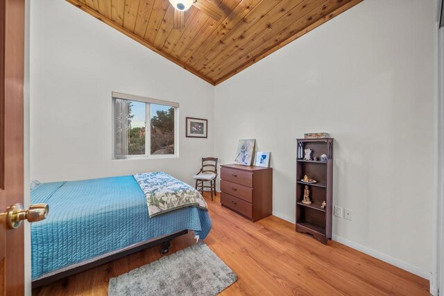 35465 Sunset Ln, Julian, CA 92036 - bedroom featuring lofted ceiling, wood ceiling, and light wood-style flooring