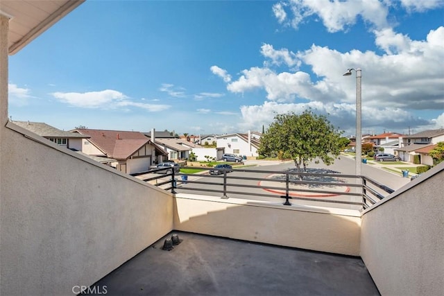 balcony featuring a residential view