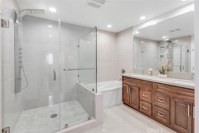 full bathroom with a stall shower, visible vents, and a sink