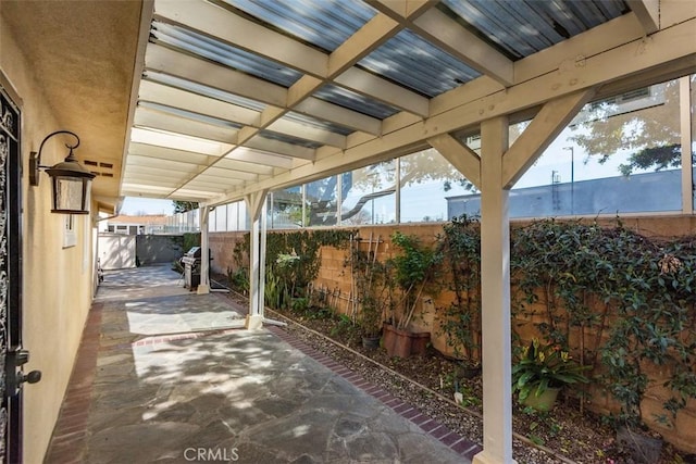 view of patio with a fenced backyard and grilling area