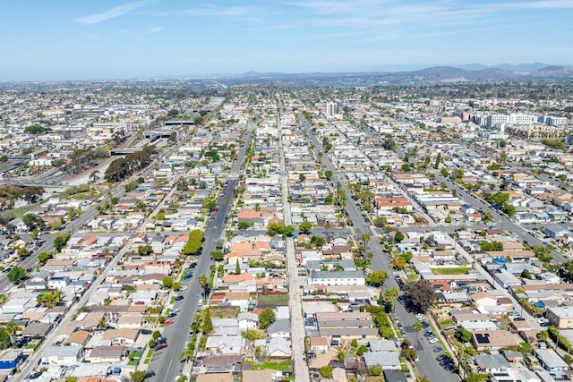 birds eye view of property with a residential view