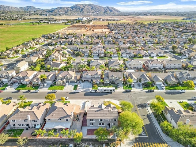 drone / aerial view featuring a mountain view and a residential view