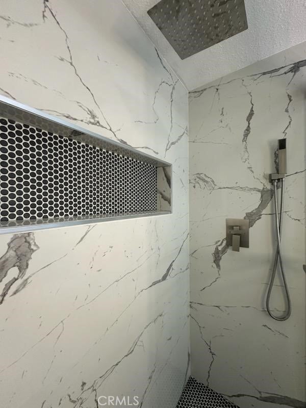 details with a marble finish shower