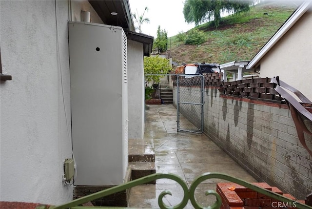 view of patio / terrace with a gate and fence