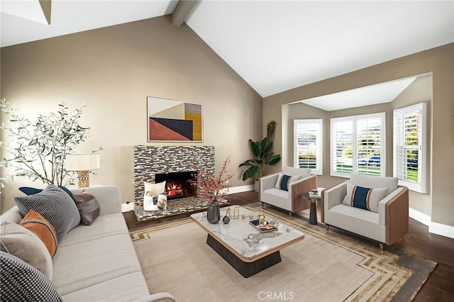 living room featuring baseboards, wood finished floors, beamed ceiling, a fireplace, and high vaulted ceiling