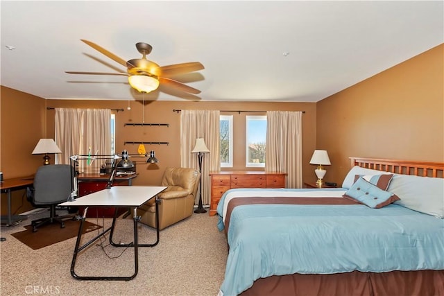 carpeted bedroom with a ceiling fan