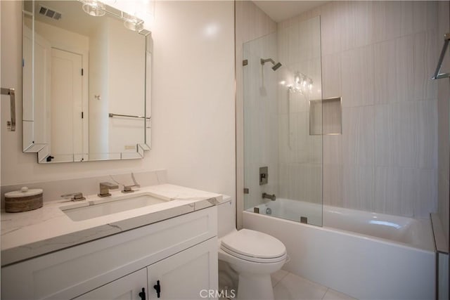 bathroom featuring shower / bathtub combination, visible vents, toilet, vanity, and tile patterned floors