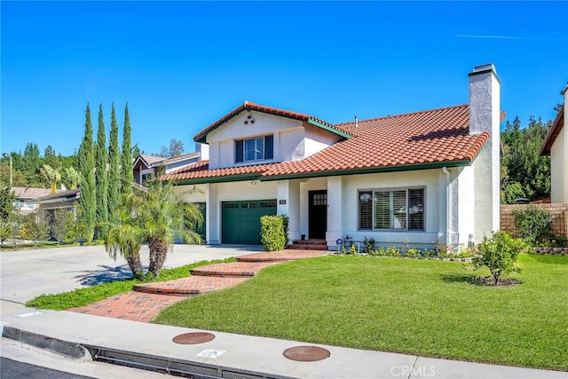 mediterranean / spanish home with a tile roof, stucco siding, an attached garage, a front yard, and driveway