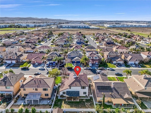 birds eye view of property with a residential view