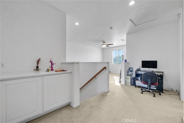 home office with attic access, recessed lighting, and light carpet