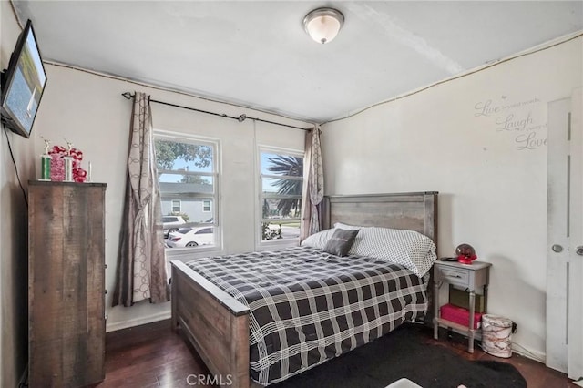 bedroom featuring wood finished floors