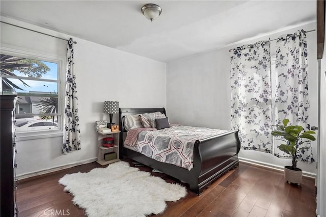 bedroom featuring wood finished floors