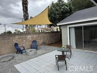 view of patio / terrace with fence