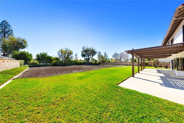 view of yard featuring a pergola and a patio