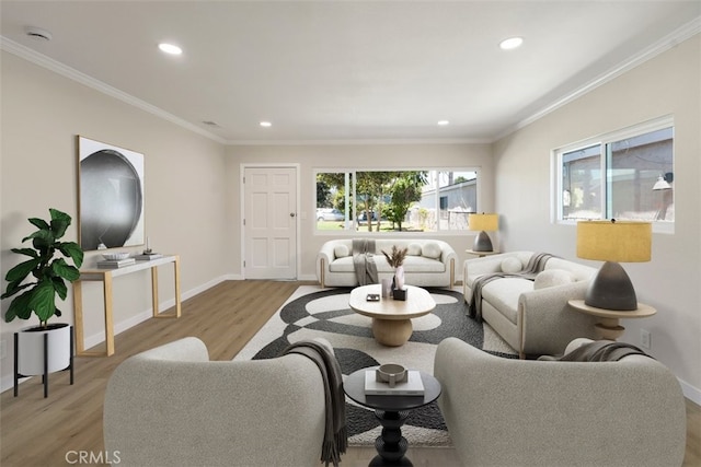 living area with ornamental molding, recessed lighting, baseboards, and wood finished floors