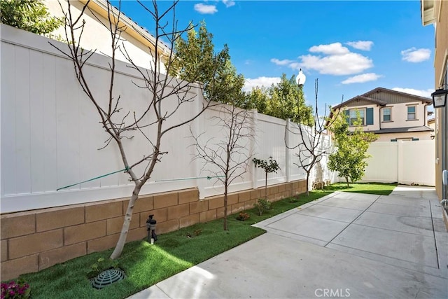 view of patio with a fenced backyard