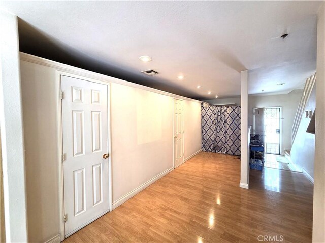 9146 Tobias Ave Unit 3, Panorama City, CA 91402 - corridor featuring light wood-style floors, baseboards, and recessed lighting